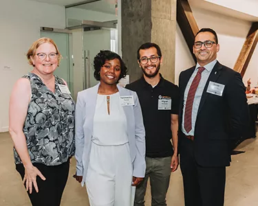 Office of Institutional Diversity team members Pamela Johnson, Temmecha Turner, Miguel Arellano and Scott Vignos support the community launch of Access OSU on Aug. 10 in Portland. Photo by @juliankdesigns.
