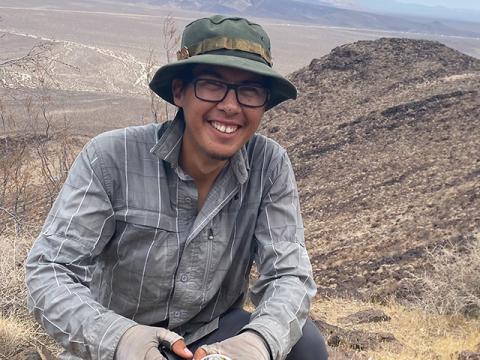 Jose Torres collects samples for bighorn sheep research in the Mojave Desert.